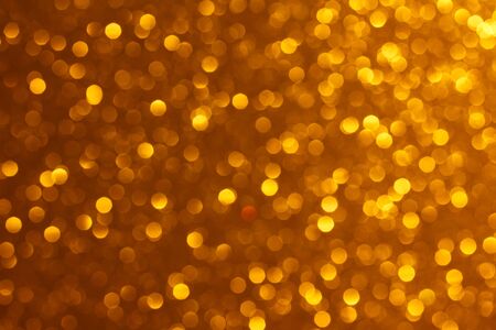 Bright warm golden lights bokeh backgroundの写真素材