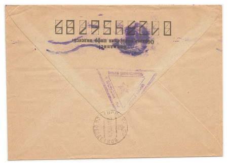Vintage russian envelope with meter stamps, old yellowed paper, isolated on white. Russian inscription: "Attention! Sample of filling zip-code"の写真素材