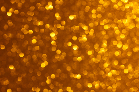 Bright golden lights bokeh backgroundの写真素材
