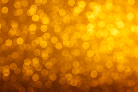 Warm bright golden lights bokeh backgroundの写真素材