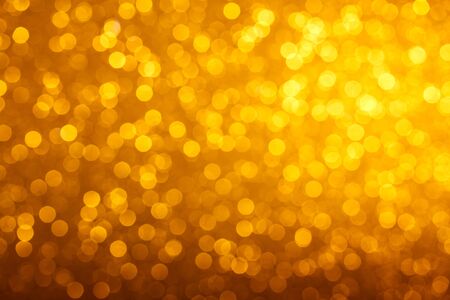 Warm bright golden lights bokeh backgroundの写真素材