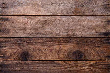 Weathered horizontal wooden planks backgroundの写真素材