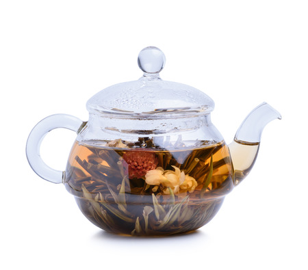 Hot tea in glass teapot isolated on white backgroundの写真素材