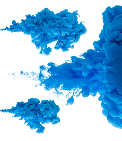 Set of blue ink clouds pouring in water isolated on white backgroundの写真素材
