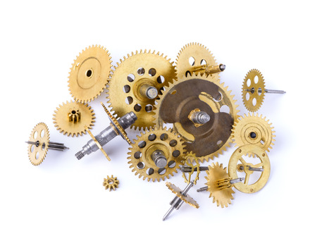 Different small gears heap on white backgroundの写真素材