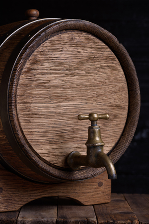 Old barrel on wooden tableの写真素材