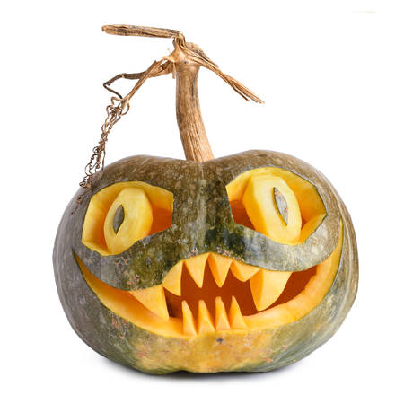 Halloween pumpkin carved isolated on white backgroundの写真素材