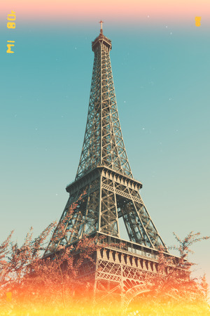 Eiffel Tower in Paris, old film stylized with white paper scratches and light leaksの写真素材