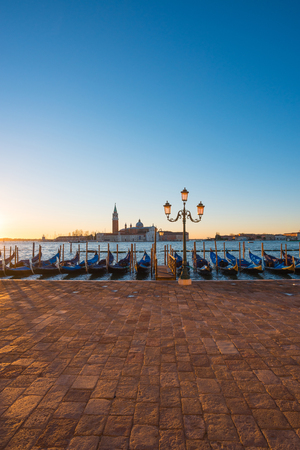 Venice Italy gondolas at sunriseの写真素材