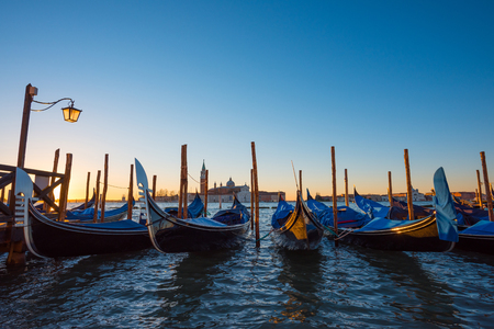 Gondola boats. Venice Italy gondola boats at seafront near San Marco square at sunrise.の写真素材