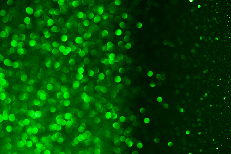 Dark green horizontal bokeh backgroundの写真素材