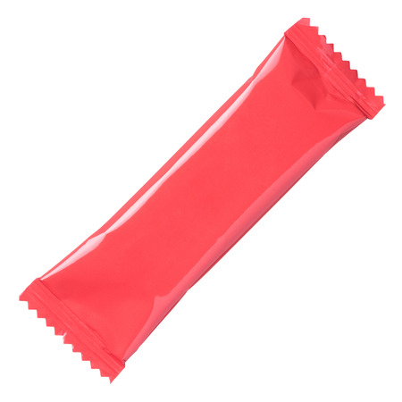 Blank red closed glossy foil snack chocolate candy or food bar packaging with zigzag tear corners isolated on white backgroundの写真素材