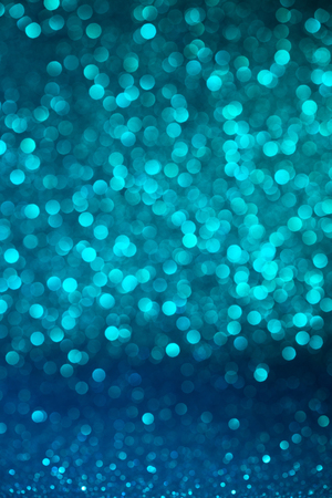 Vintage defocused turquoise bokeh vertical backgroundの写真素材