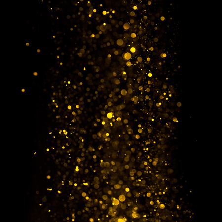 Abstract golden shiny glitter bokeh lights backgroundの写真素材