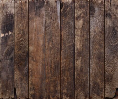 Vintage weathered wood planks background texture with rusty nails flat layの写真素材