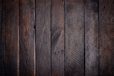 Dark stained wooden planks backgroundの写真素材