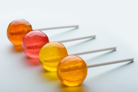 Lollipops assortment on pastel backgroundの写真素材