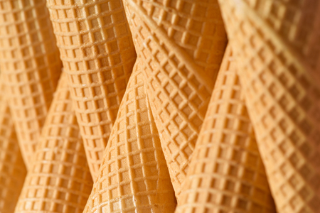 Ice cream waffle cones row abstract backgroundの写真素材