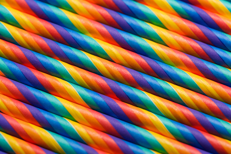 Cocktails straws in row abstract backgroundの写真素材