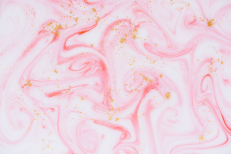 Gold and pink marble paint abstract texture backgroundの写真素材