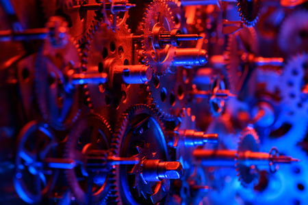 Gears and cogs red and blue light colored.の写真素材