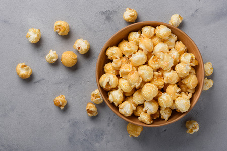 Caramel popcorn in bowlの写真素材