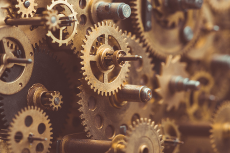 Vintage gears and cogs in mechanism macroの写真素材
