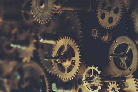 Vintage mechanism with gears and cogs retro tonedの写真素材