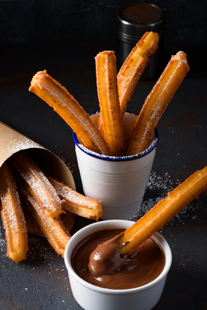 Churro in chocolate dipの写真素材
