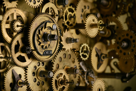 Gears and cogs in old vintage mechanism macro closeupの写真素材