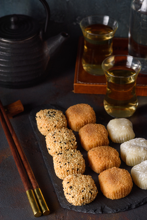 Mochi assortment on slate plate japanese rice dessertの写真素材