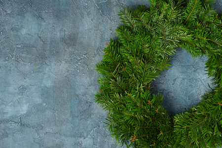 Natural fir christmas wreath on backdrop overhead view with copy spaceの写真素材