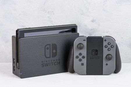 Krakow, Poland - Januray  14, 2020: Nintendo Switch gaming console still-life. Illustrative...