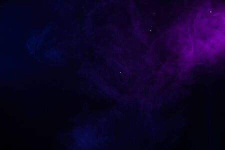 Magical glowing smoke with shiny glitter backgroundの写真素材