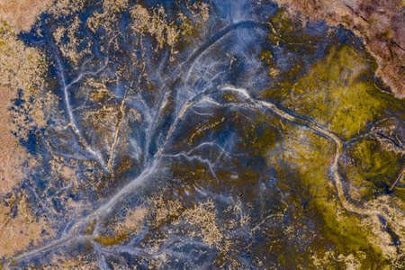 Aerial drone view of industrial chemicals dump site from ironlworks, dry soil with unique texture.の写真素材