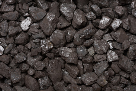 Natural black stone coal background top view. Fossil fuel coal lumps texture.の写真素材