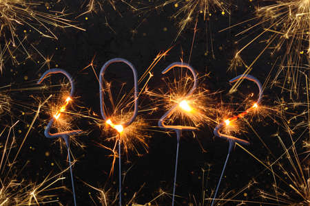2022 Happy new year card with with shiny sparklersの写真素材