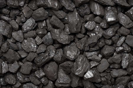 Coal texture top view. Natural black stone coal lumps background.の写真素材