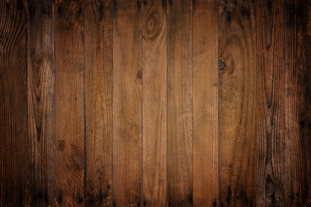 Dark wooden background of vintage vignette weathered wood planksの写真素材