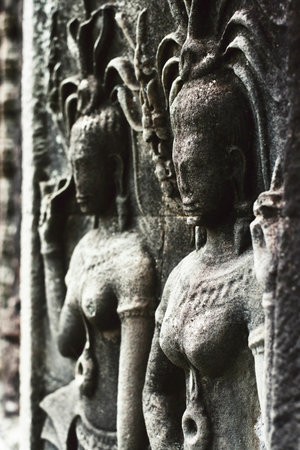 Apsara an old Khmer art carvings on the wall in Angkor Wat temple near Siem Reap town, Cambodiaの写真素材