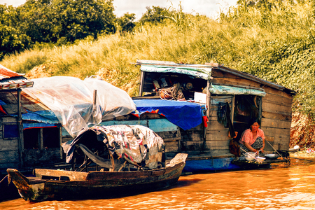 Tonle Sap Lake Siem Reap, Cambodia - July 13, 2013: Cambodian people live on Tonle Sap Lake in Siem Reap, Cambodia. Unidentified people in a Floating village on the Tonle Sap Lakeのeditorial素材