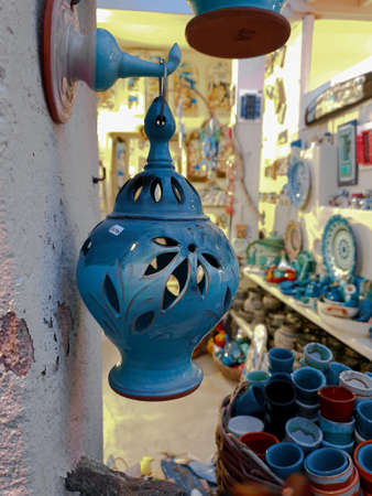Mykonos, Greece, 08 November 2019: Blue decorative porcelain lantern for souvenir in antique dÃ©cor shopのeditorial素材