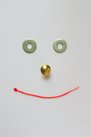 screw and cable concept face smileの写真素材