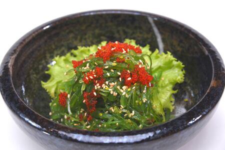 Hiyashi Wakame Chuka , Seaweed salad with sesame and tobikoの写真素材