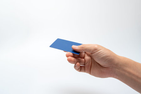 Hand holding a credit card