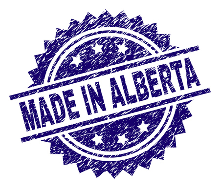 MADE IN ALBERTA stamp seal watermark with distress style. Blue vector rubber print of MADE IN ALBERTA label with unclean texture.のイラスト素材