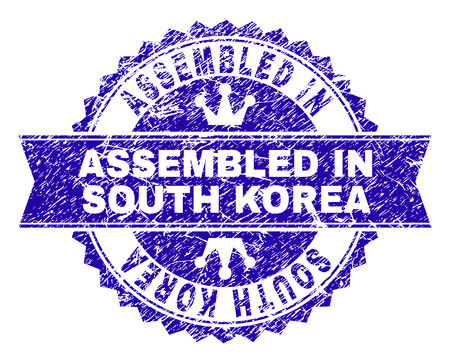 ASSEMBLED IN SOUTH KOREA rosette stamp seal watermark with grunge texture. Designed with round rosette, ribbon and small crowns.のイラスト素材