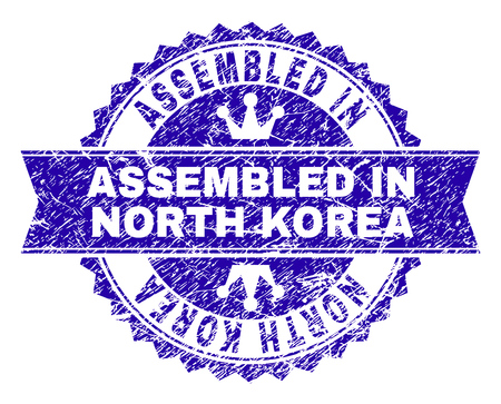 ASSEMBLED IN NORTH KOREA rosette stamp seal overlay with distress style. Designed with round rosette, ribbon and small crowns.のイラスト素材