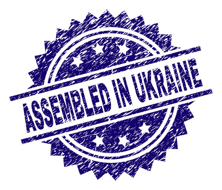 ASSEMBLED IN UKRAINE stamp seal watermark with distress style. Blue vector rubber print of ASSEMBLED IN UKRAINE tag with dirty texture.のイラスト素材
