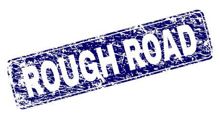 ROUGH ROAD stamp seal print with grunge texture. Seal shape is a rounded rectangle with frame. Blue vector rubber print of ROUGH ROAD label with dust texture.のイラスト素材